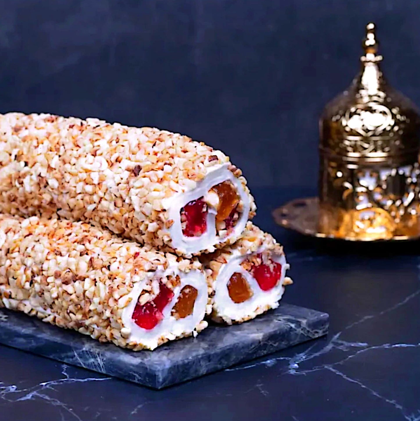 BRASS HAZELNUT COATED POMEGRANATE ORANGE FLAVORED HAZELNUT - 100g